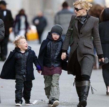 Cate Blanchett walking on road along with her two son. 